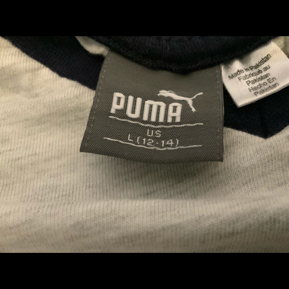 A gray Puma shirt